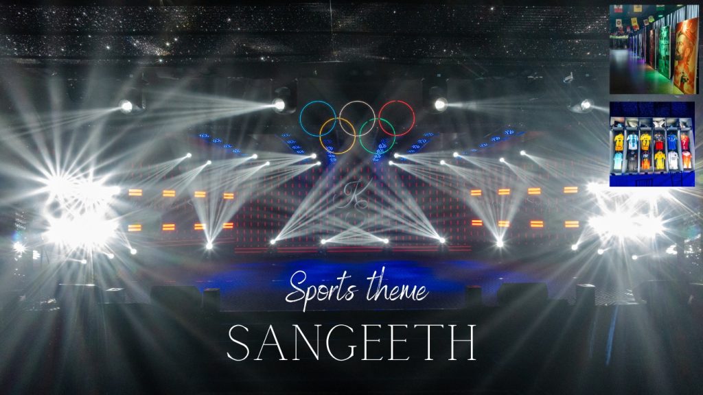 Dramatic Sports-Themed Sangeet Stage with Bright Spotlights, Concert Lighting, and Olympic Rings