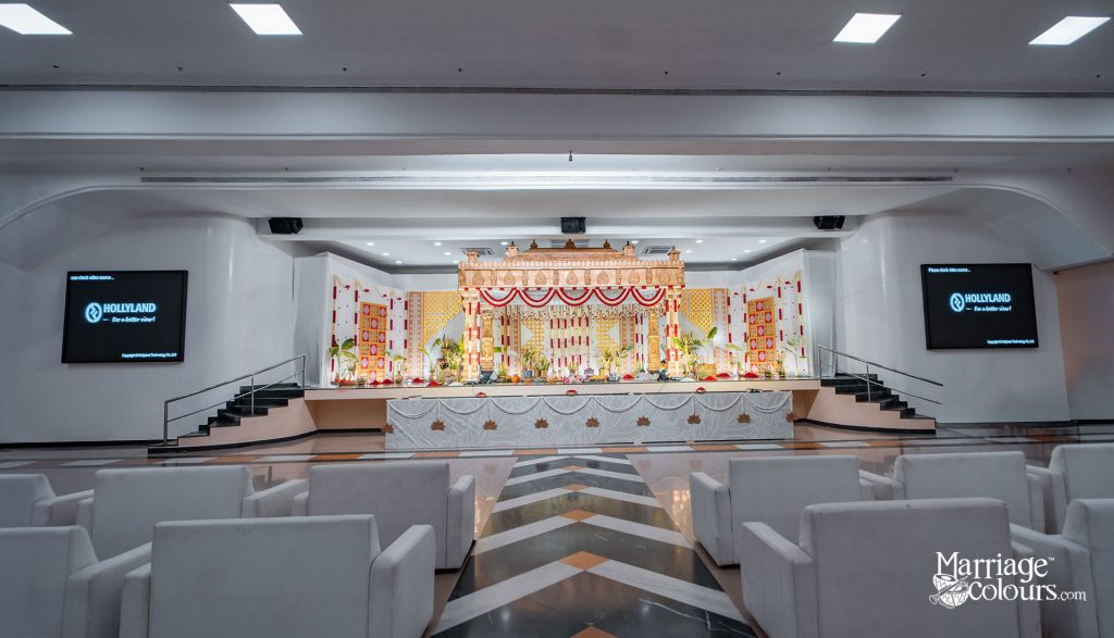 South Indian wedding hall with golden mandap