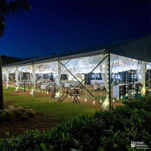Luxury destination beach wedding setup by Mariage Colours at one of the best beach resorts in Mahabalipuram, featuring an oceanfront lawn venue with premium floral decor.