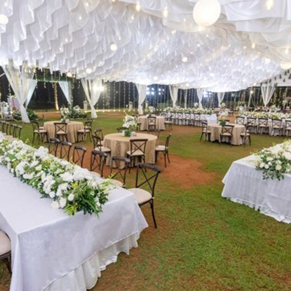 Luxury destination beach wedding setup by Mariage Colours at one of the best beach resorts in Mahabalipuram, featuring an oceanfront lawn venue with premium floral decor.